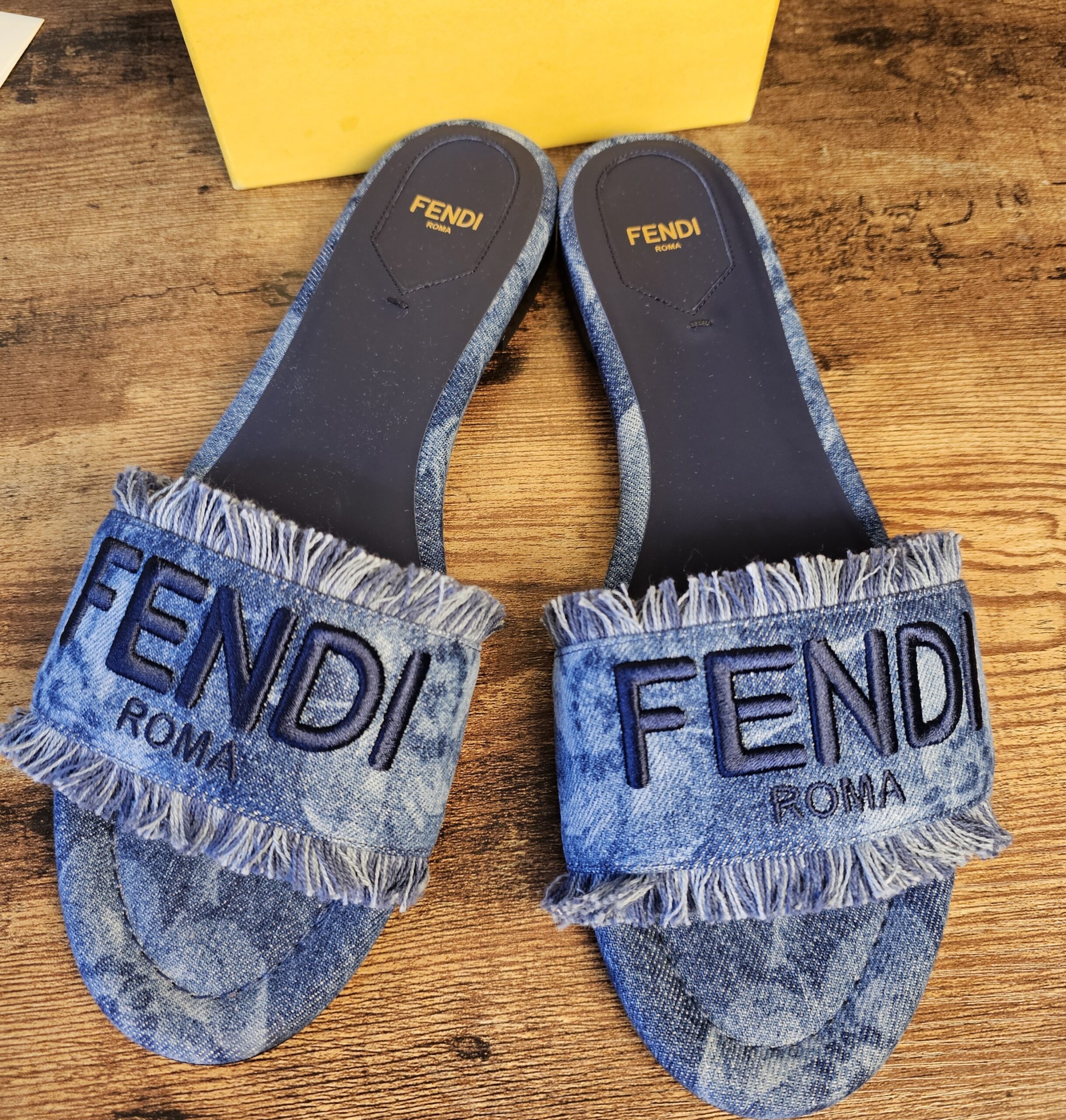 Denim slides with fringe