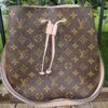 Louis Vuitton NeoNoe MM bucket bag in Monogram canvas with Rose Poudre pink leather trim and drawstring closure