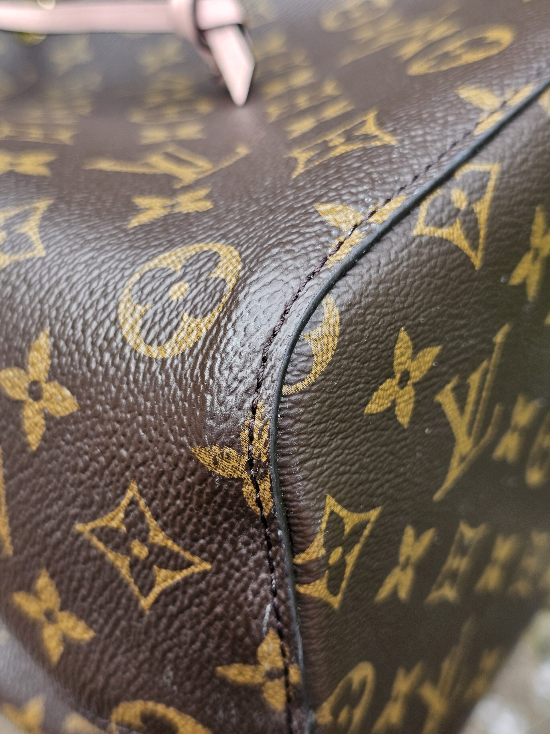 Close-up of the Monogram coated canvas on the Louis Vuitton NeoNoe MM