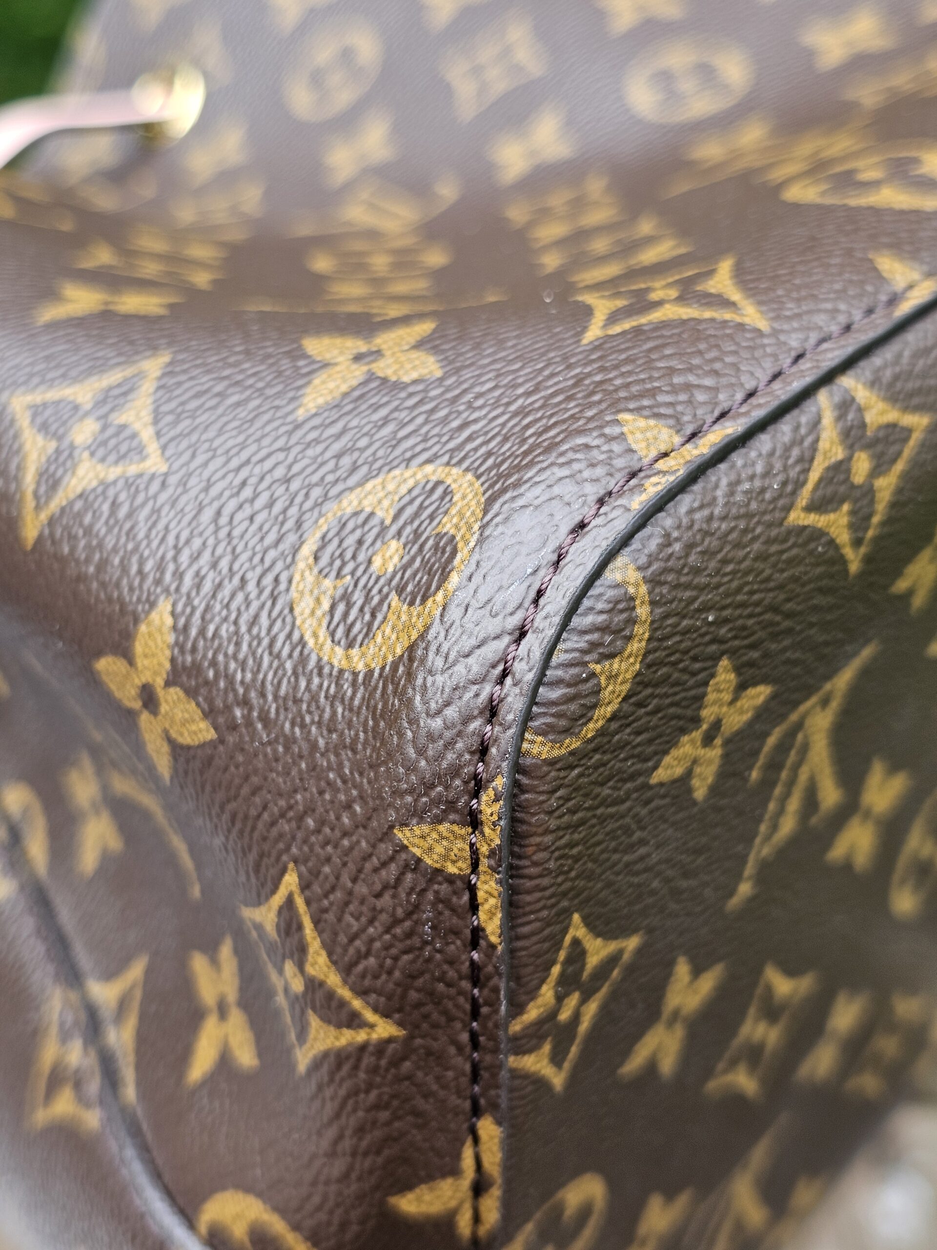 Stitching and canvas detail on the body of the Louis Vuitton Monogram NeoNoe MM