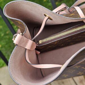Interior zip divider pocket inside the Louis Vuitton Monogram NeoNoe MM