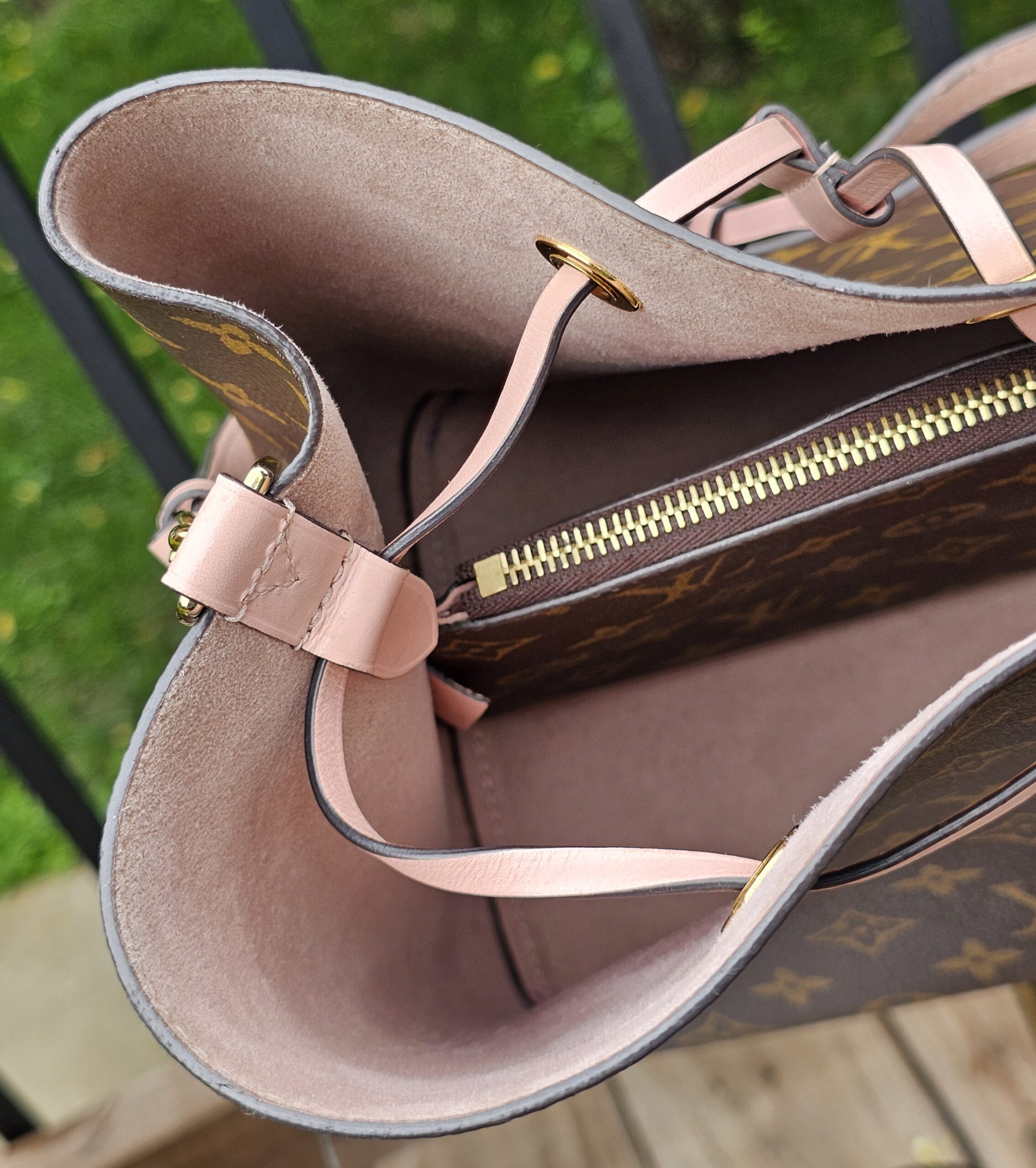 Interior zip divider pocket inside the Louis Vuitton Monogram NeoNoe MM