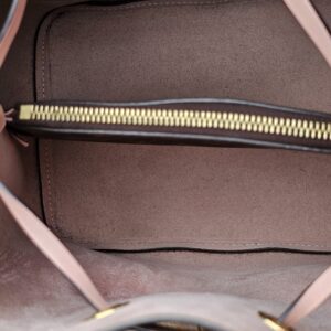 Gold-tone interior zip of the divider pocket in the Louis Vuitton Monogram NeoNoe MM