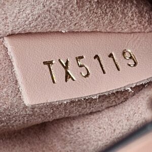 Date code TX5119 stamped on the Rose Poudre leather tab inside the Louis Vuitton NeoNoe MM