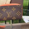 Louis Vuitton Monogram Zippy Multicartes shown with its dust bag and box