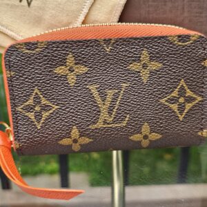 Louis Vuitton Zippy Multicartes in Monogram canvas with Piment orange leather zip pull
