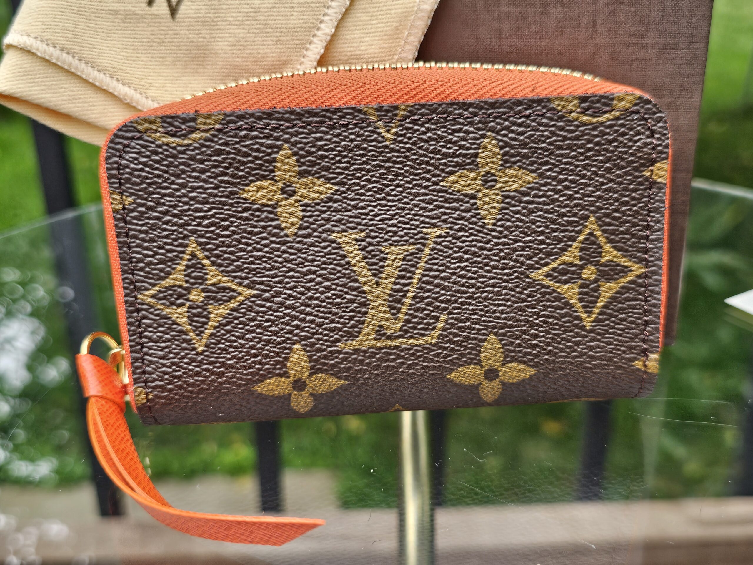 Louis Vuitton Zippy Multicartes in Monogram canvas with Piment orange leather zip pull
