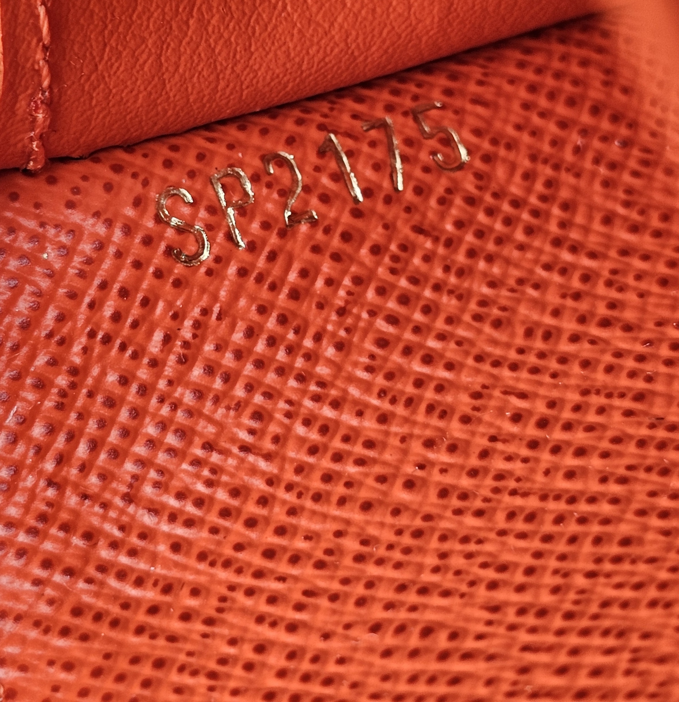 Date code SP2175 stamped inside the Louis Vuitton Monogram Zippy Multicartes