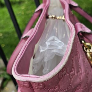 Interior clasp closure of the Gucci Guccissima Large Heart Bit tote