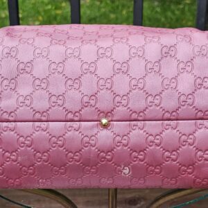 Base of the Gucci Guccissima Heart Bit tote with protective metal feet