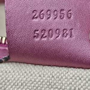 Style numbers 269956 and 520981 embossed on the tag inside the Gucci Heart Bit tote