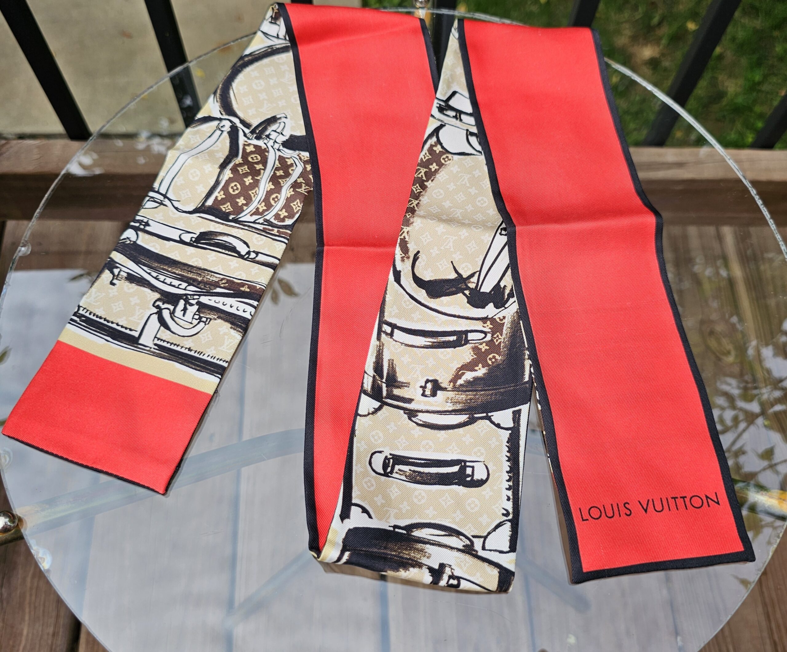 Louis Vuitton Trunks bandeau in silk with Monogram luggage illustrations in beige and brown and red end panels