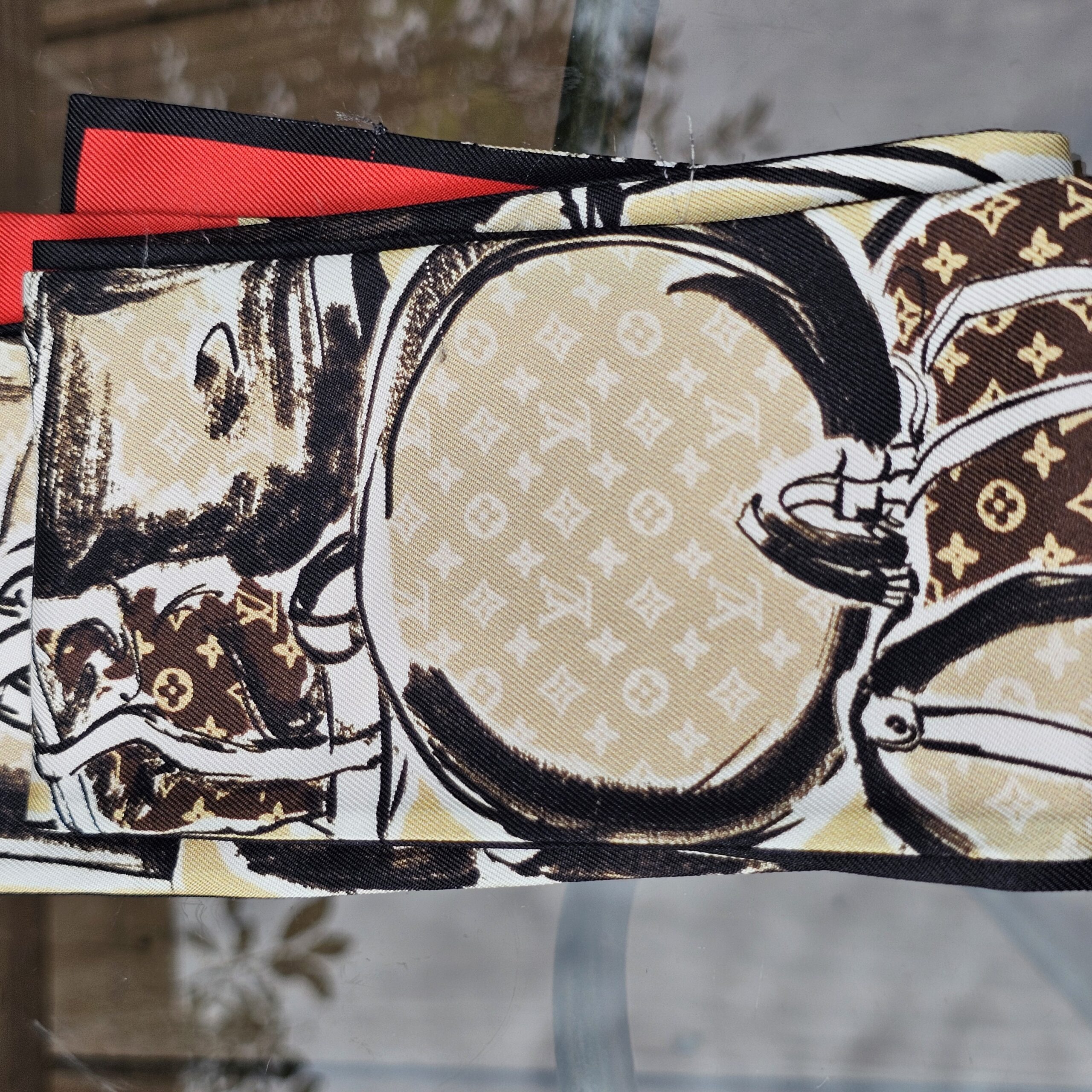 Monogram hat box and trunk illustration printed on the Louis Vuitton silk bandeau