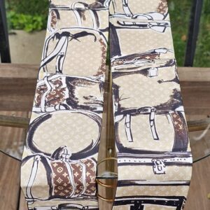 Louis Vuitton Silk Monogram Trunks bandeau folded to show the full print repeat