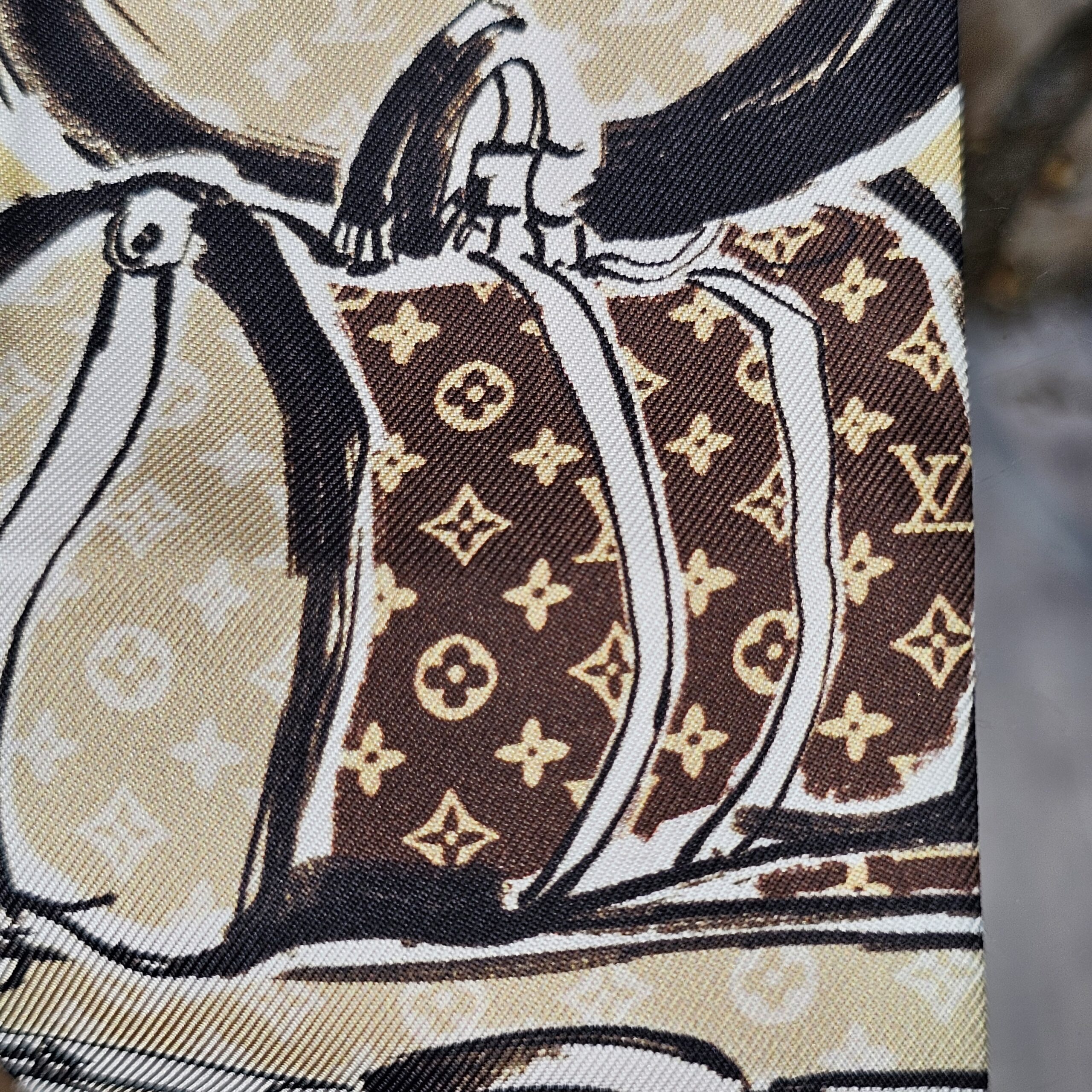 Monogram canvas trunk illustration on the Louis Vuitton silk Trunks bandeau