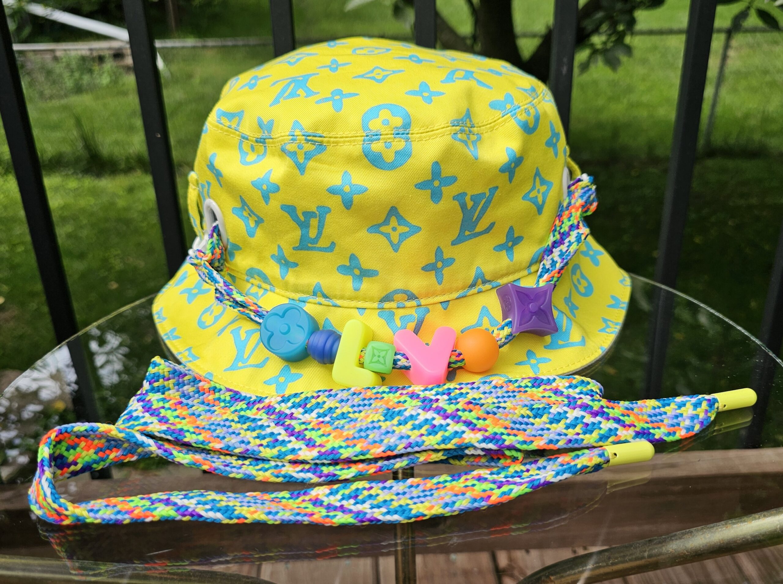 Louis Vuitton Virgil Abloh reversible bucket hat in yellow Monogram Playground cotton with a braided cord and LV beads
