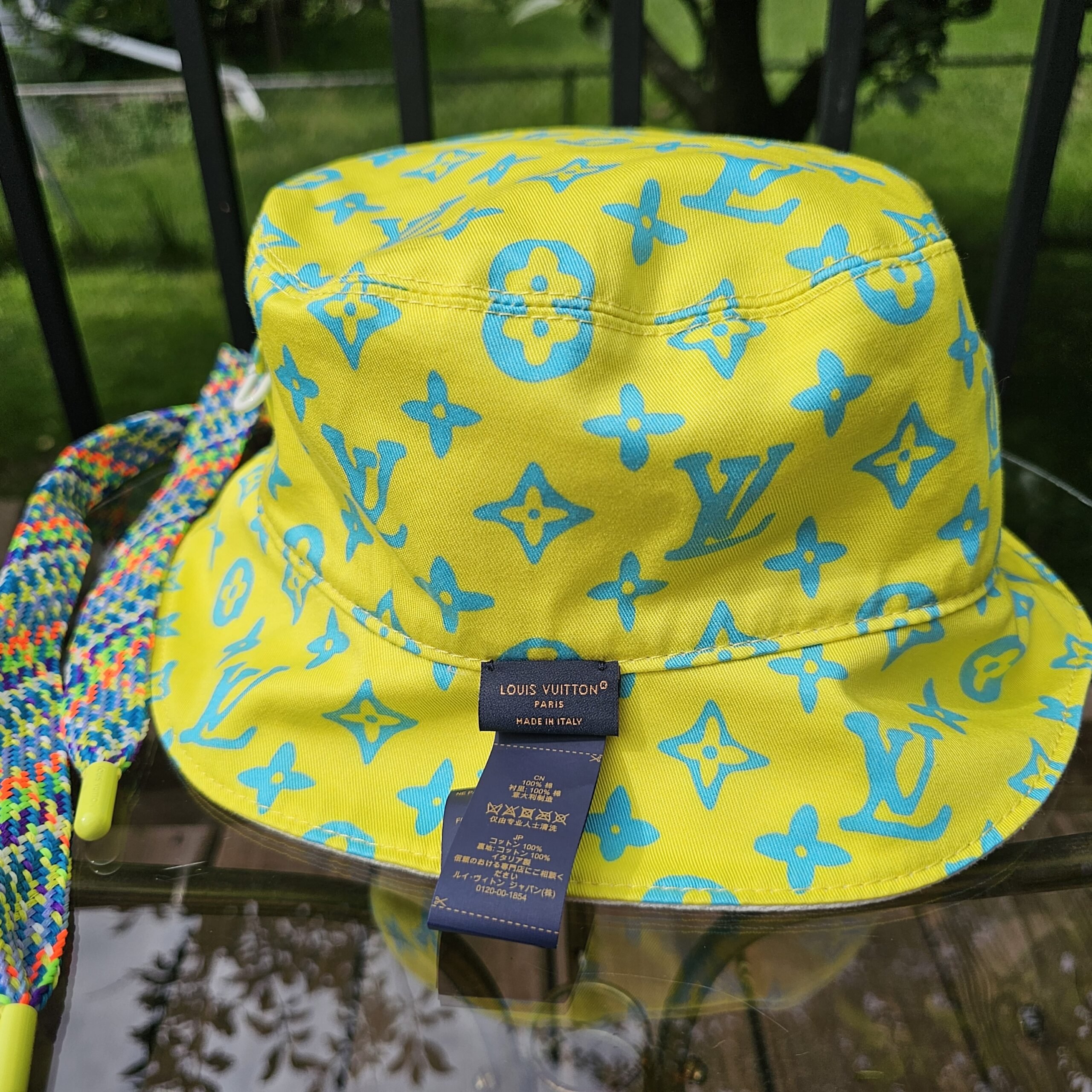 Brim of the Louis Vuitton Virgil Abloh bucket hat in yellow Monogram Playground cotton