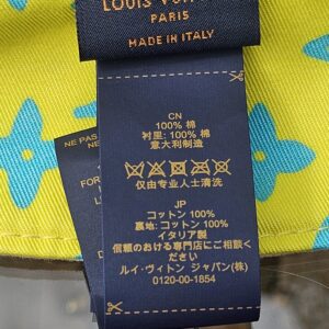 Care label inside the Louis Vuitton Virgil Abloh bucket hat listing 100% cotton and made in Italy