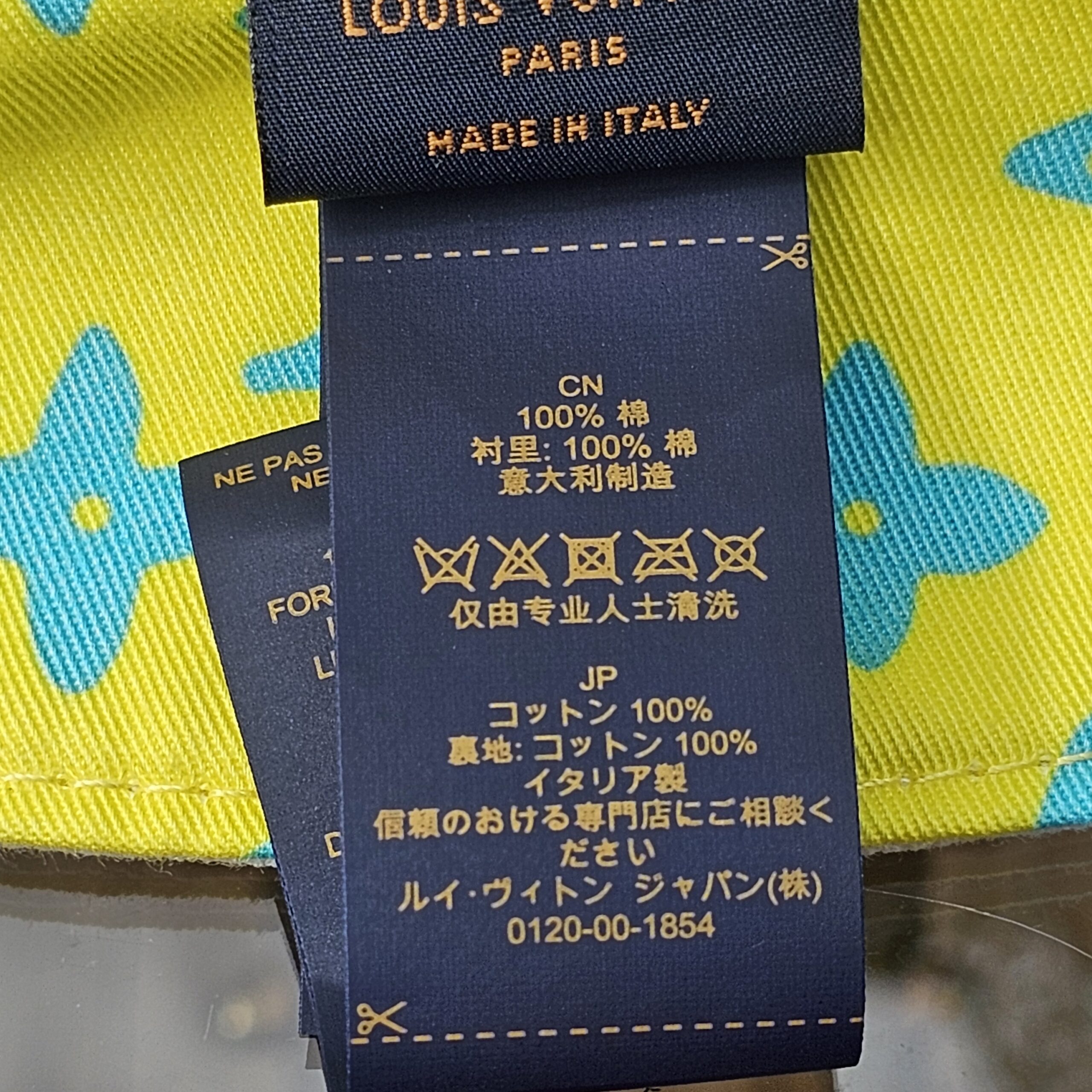 Care label inside the Louis Vuitton Virgil Abloh bucket hat listing 100% cotton and made in Italy