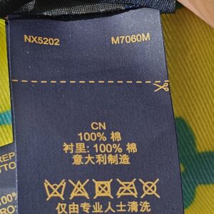 Interior label of the Louis Vuitton Virgil Abloh bucket hat showing code NX5202 and style M7060M