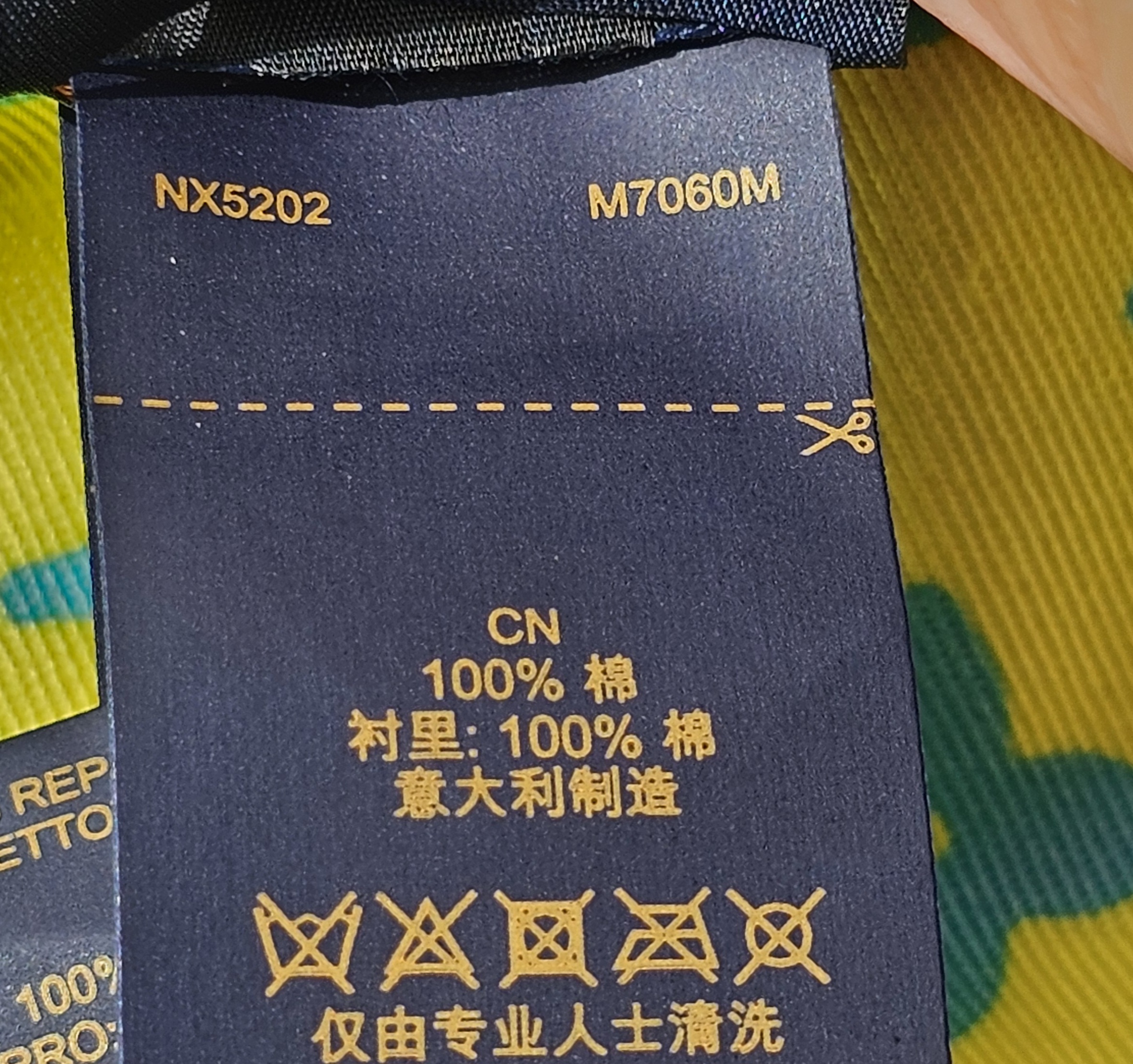 Interior label of the Louis Vuitton Virgil Abloh bucket hat showing code NX5202 and style M7060M