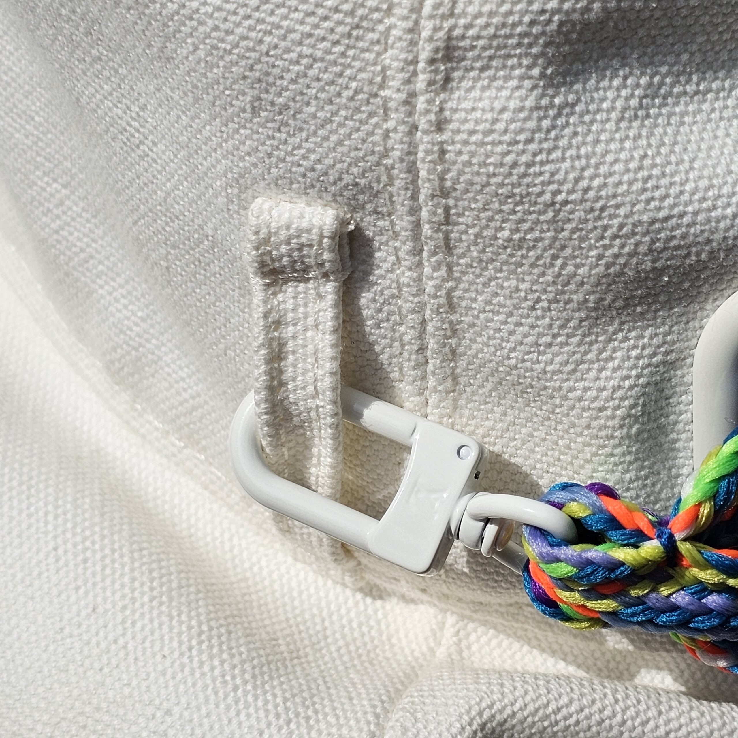 White plastic toggle and braided cord on the Louis Vuitton Virgil Abloh bucket hat