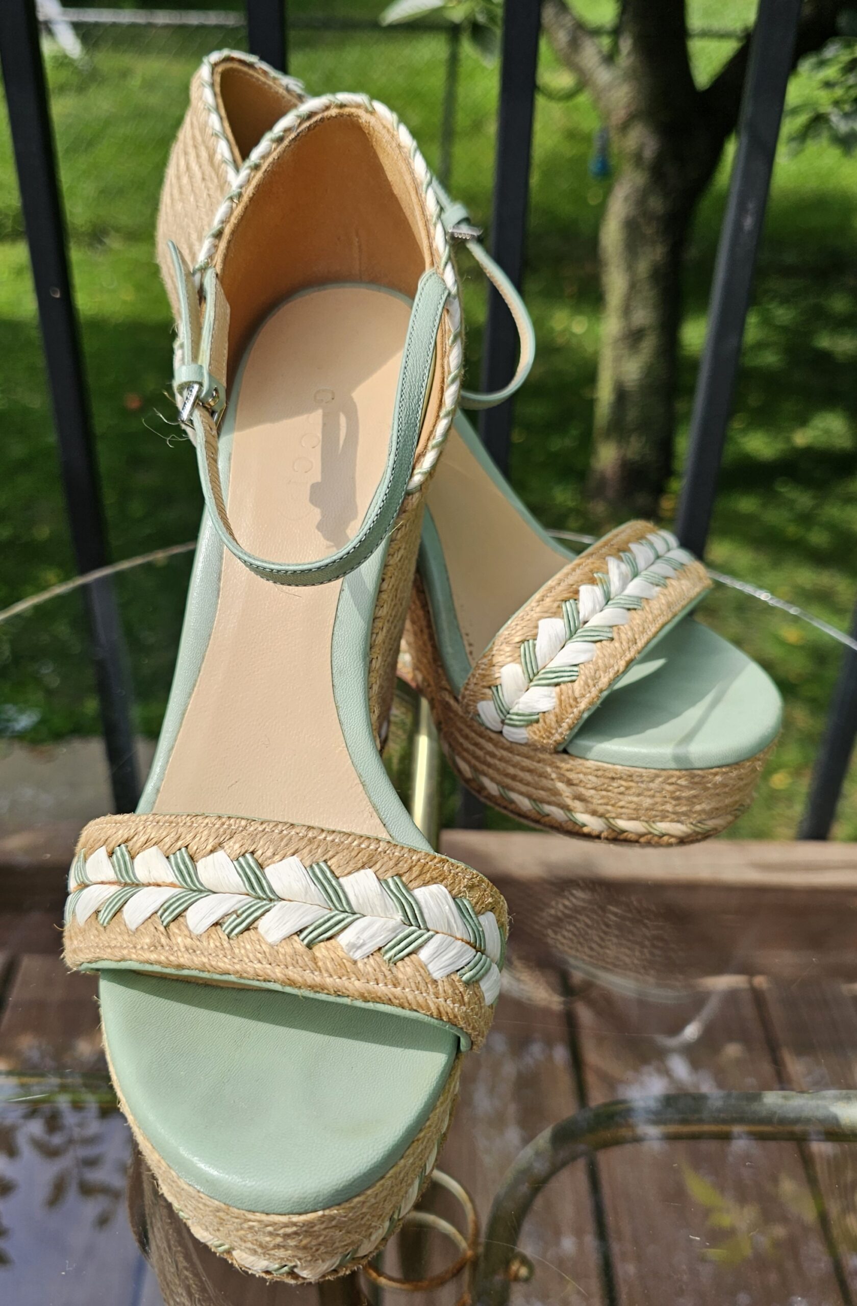 Gucci espadrille wedge sandals in mint green leather with braided cream trim on a natural jute wedge