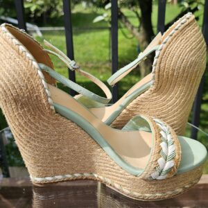 Adjustable mint green leather ankle strap on the Gucci espadrille wedge sandals