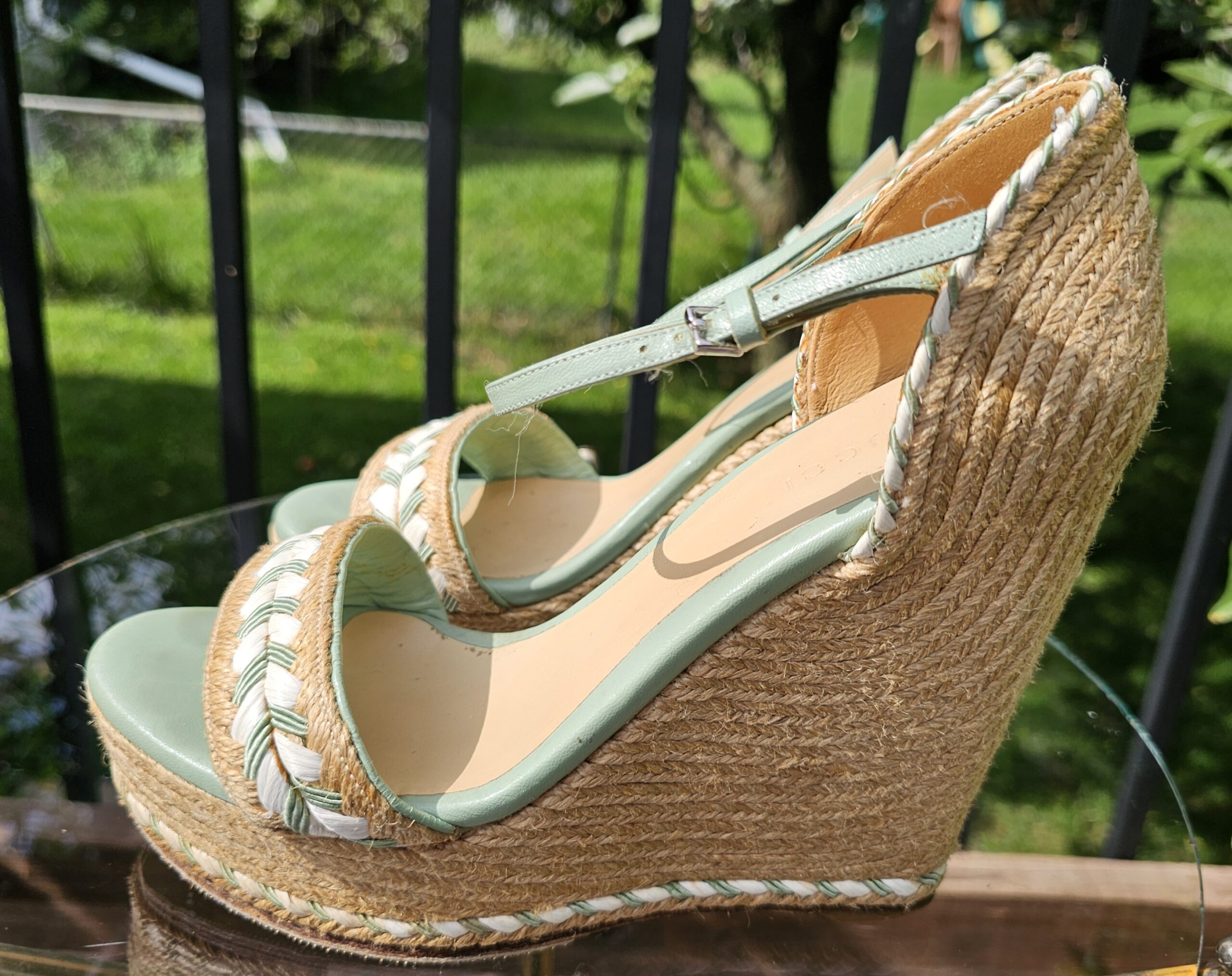 Natural woven jute wedge and platform of the Gucci mint green espadrille sandals