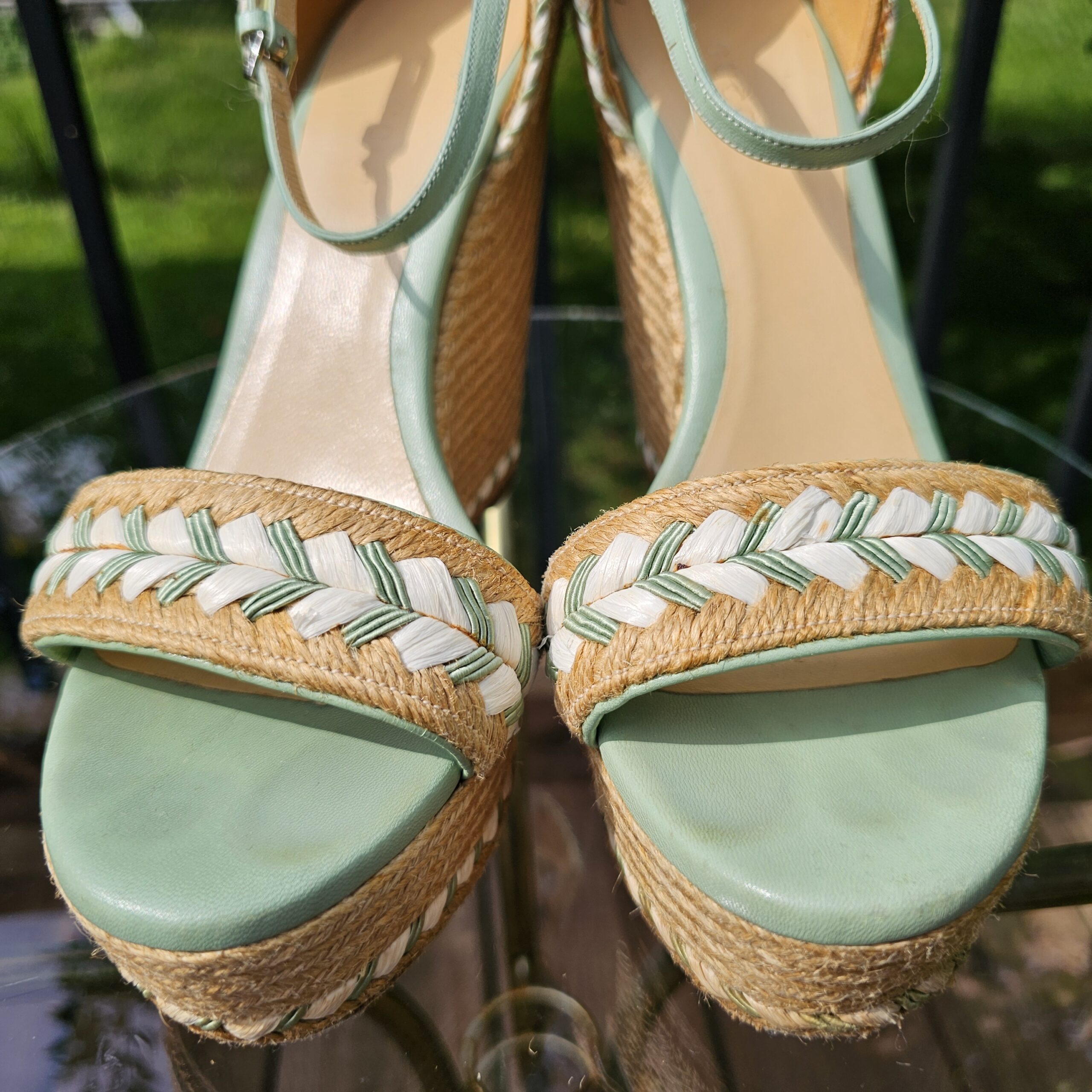 Mint green leather footbeds of the Gucci espadrille wedge sandals shown for condition