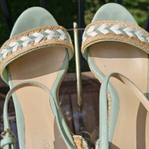 Close-up of the braided toe straps and mint green leather on the Gucci espadrille wedge sandals