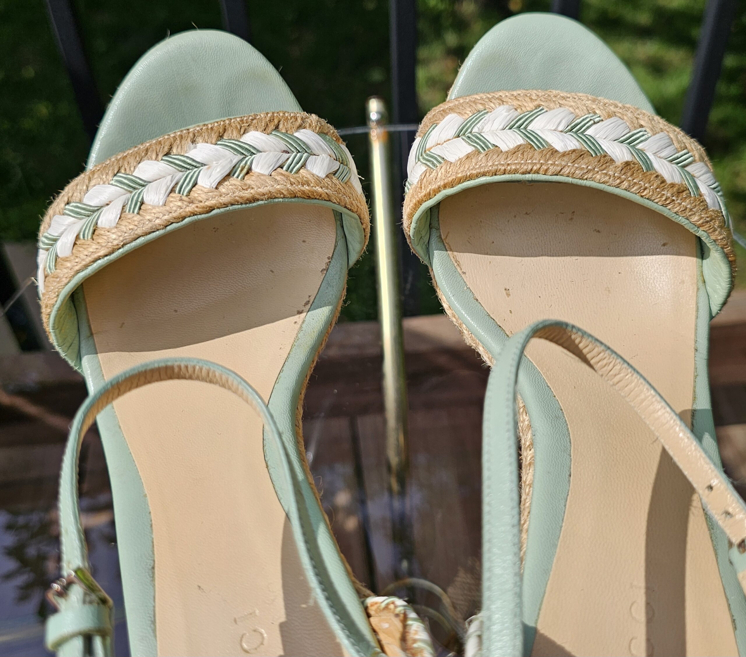 Close-up of the braided toe straps and mint green leather on the Gucci espadrille wedge sandals
