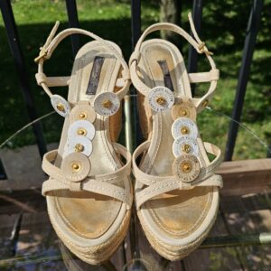 Top view of both Louis Vuitton Trunks and Bags espadrille wedge sandals showing the strappy uppers and discs
