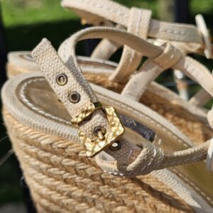 Gold-tone buckle on the adjustable ankle strap of the Louis Vuitton Trunks and Bags espadrille wedge sandals
