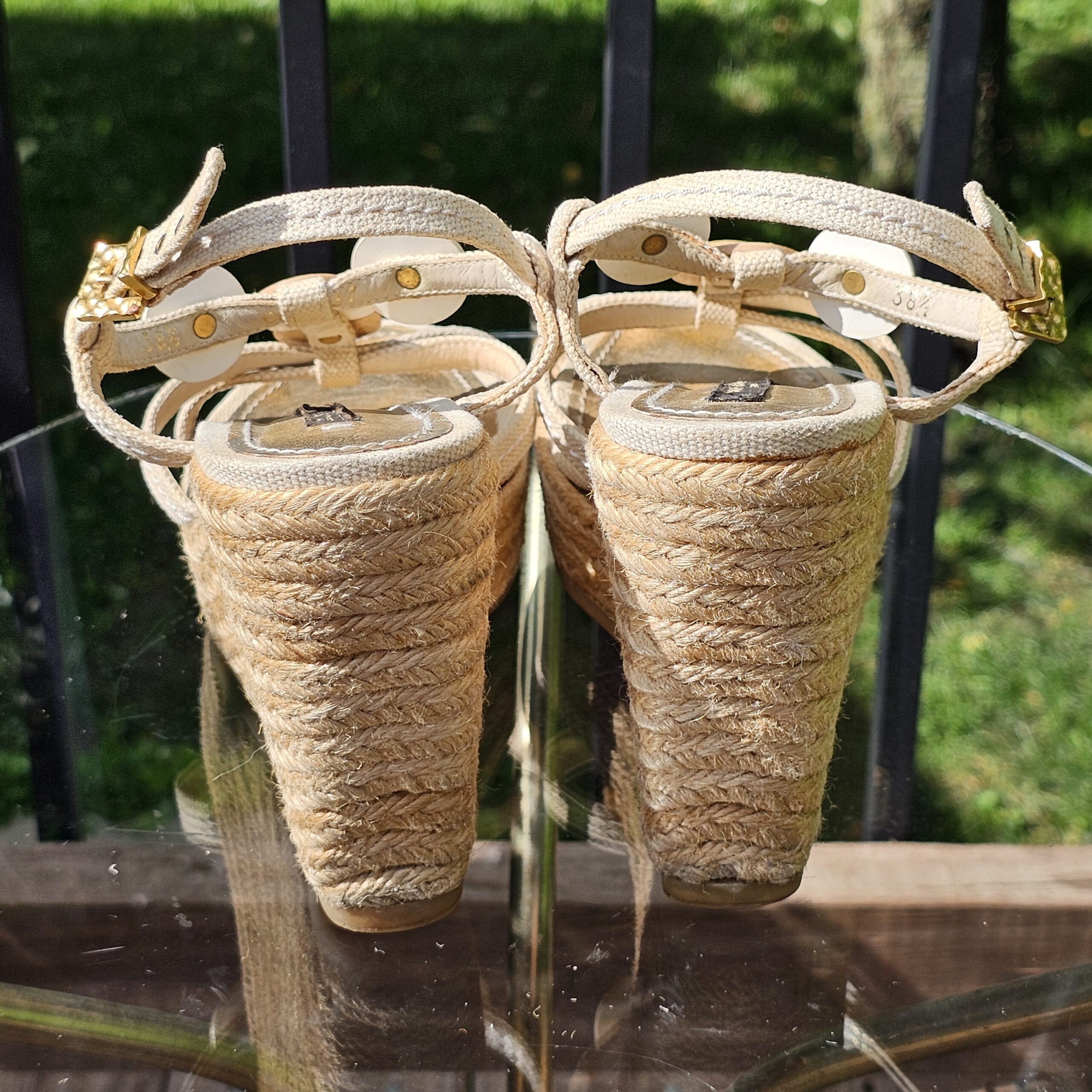 Back view of the Louis Vuitton Trunks and Bags espadrille wedge sandals showing the woven wedges