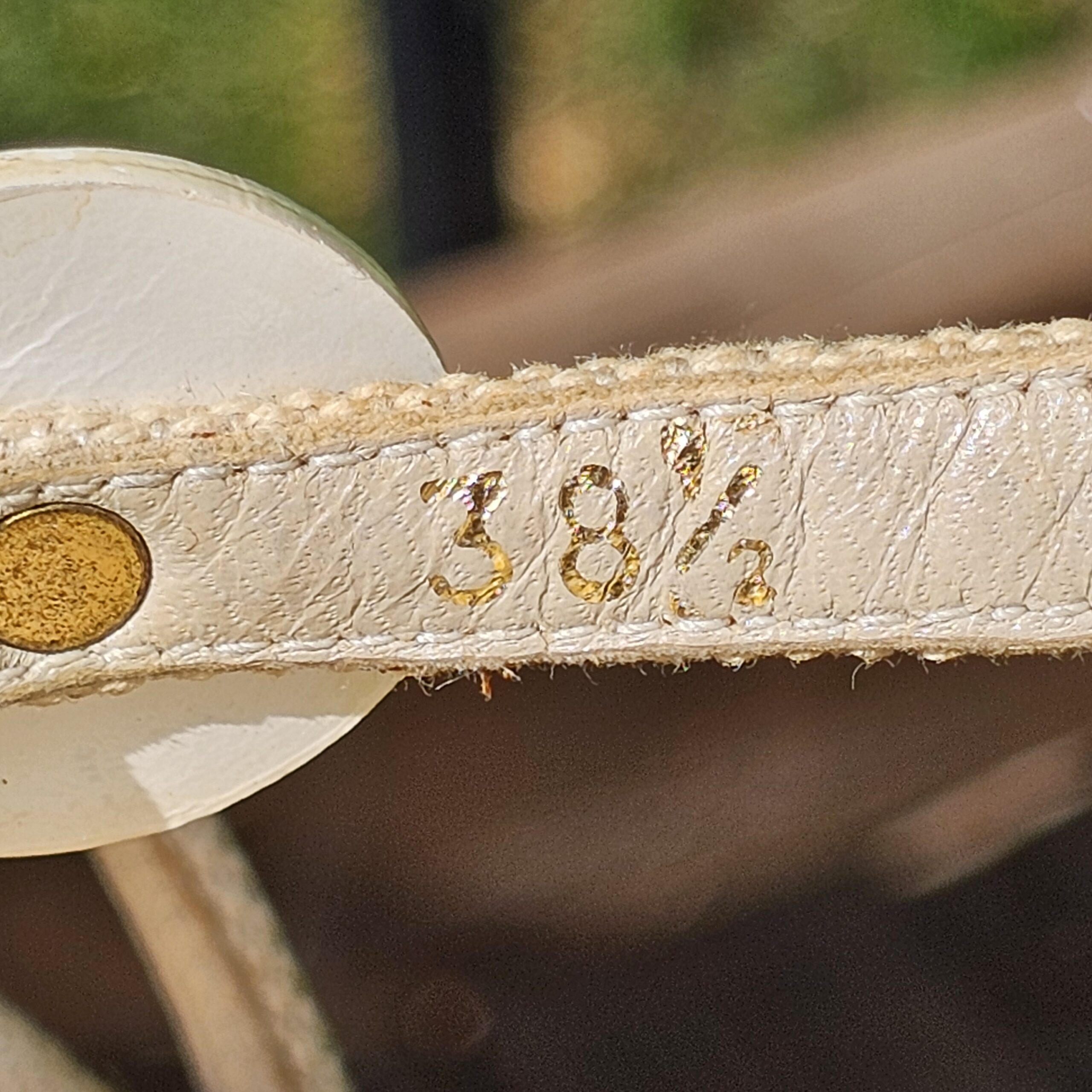 Size 38 and a half stamped on the strap of the Louis Vuitton Trunks and Bags espadrille wedge sandals