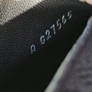 Serial number G27565 stamped inside the Chanel lace peep toe ankle booties