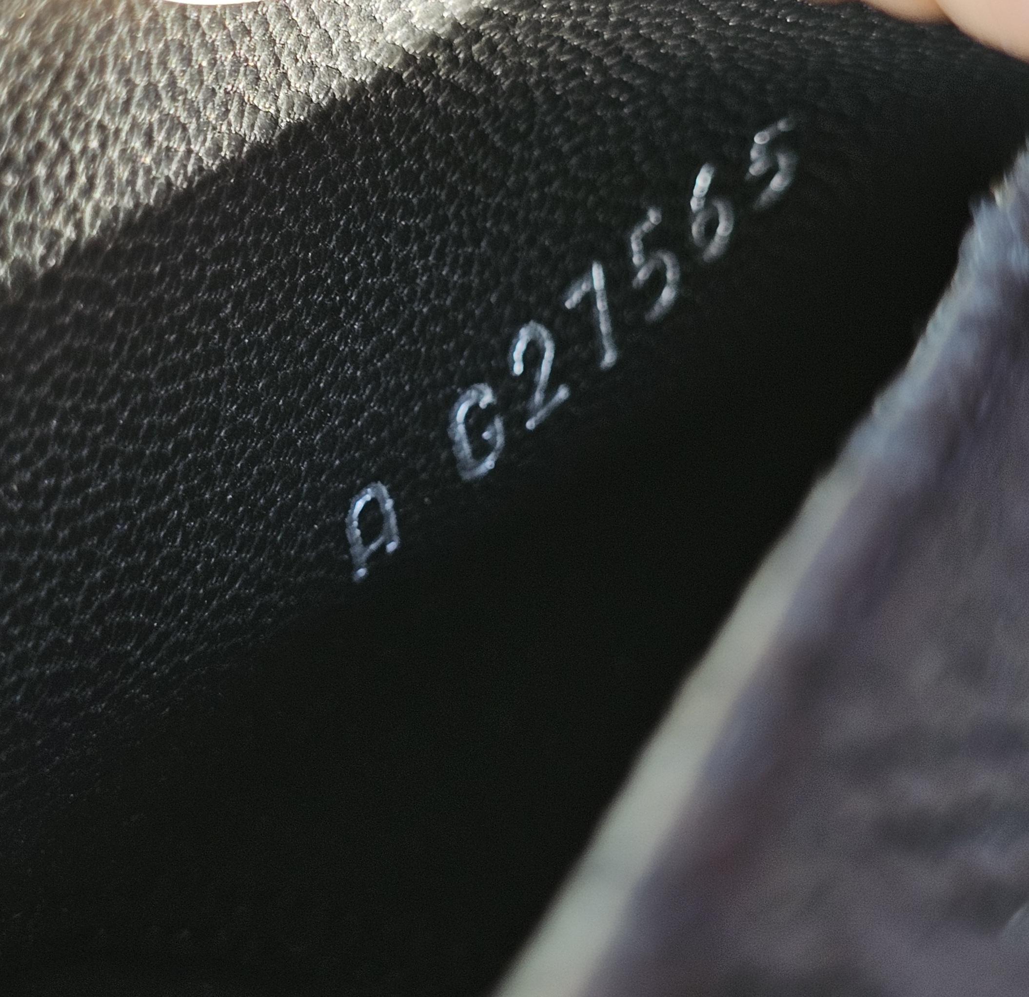 Serial number G27565 stamped inside the Chanel lace peep toe ankle booties