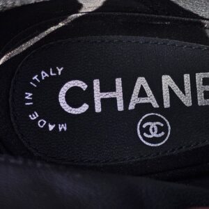 Chanel made in Italy label on the insole of the lace peep toe ankle booties