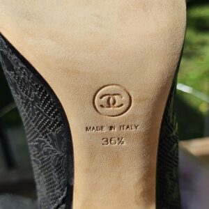 Sole of the Chanel ankle bootie stamped with the CC logo, Made in Italy and size 36 and a half