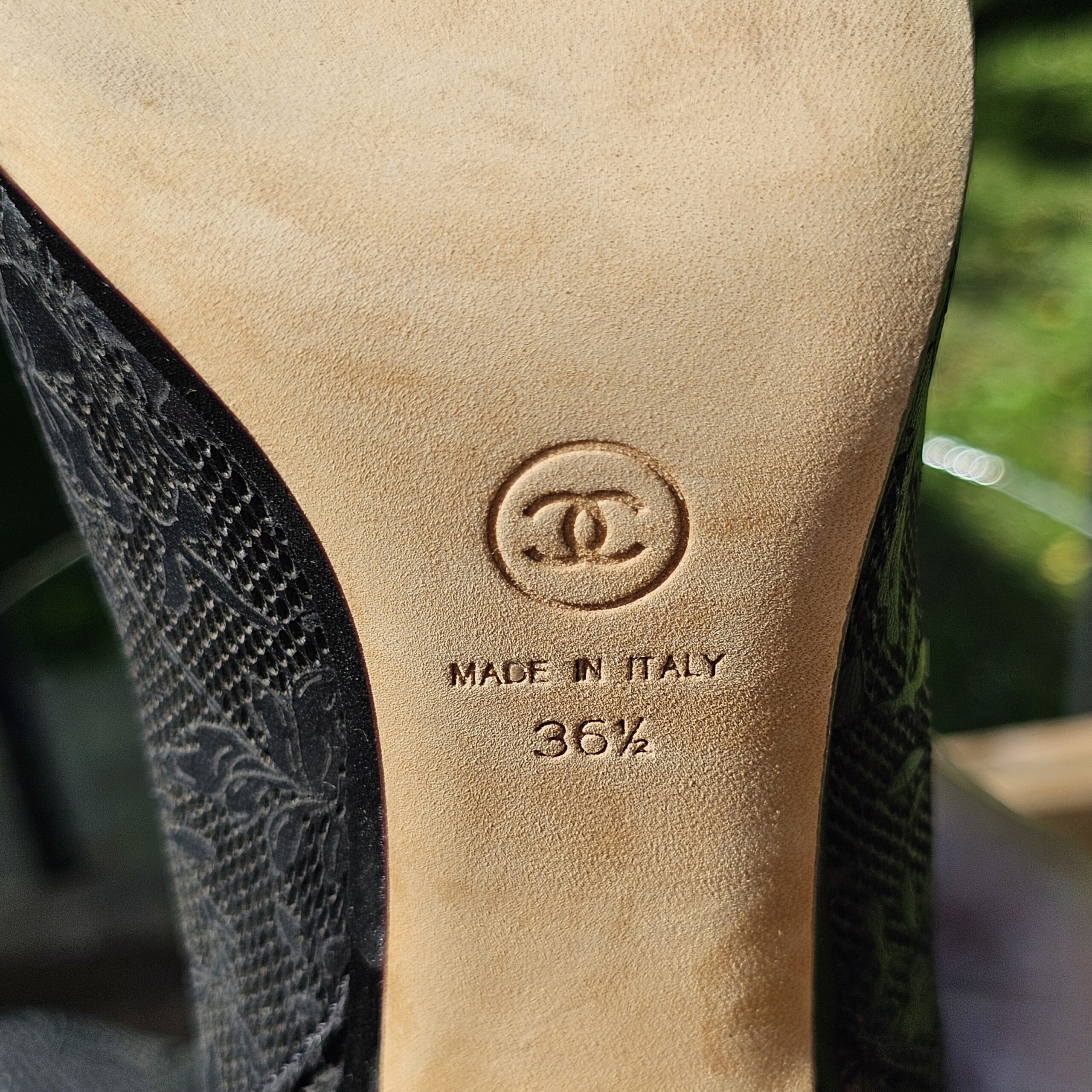 Sole of the Chanel ankle bootie stamped with the CC logo, Made in Italy and size 36 and a half