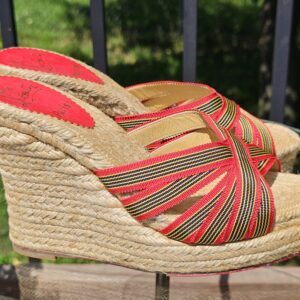 Side profile of the Christian Louboutin espadrille wedge sandals showing the jute wrapped wedge and front platform