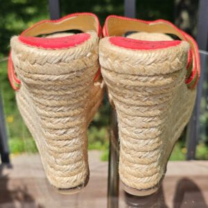 Back view of the Christian Louboutin espadrille wedge sandals showing the open heel and jute wedge construction