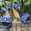 Louis Vuitton printed raffia wedge sandals in blue printed fabric with woven raffia wedges and black leather trim