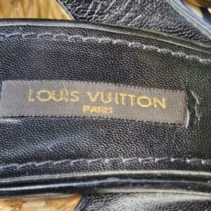 Louis Vuitton Paris stamped in gold on the black leather insole of the printed raffia wedge sandals