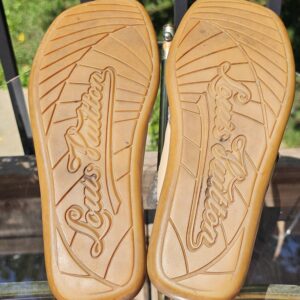 Leather soles of the Louis Vuitton Monogram denim thong sandals embossed Louis Vuitton
