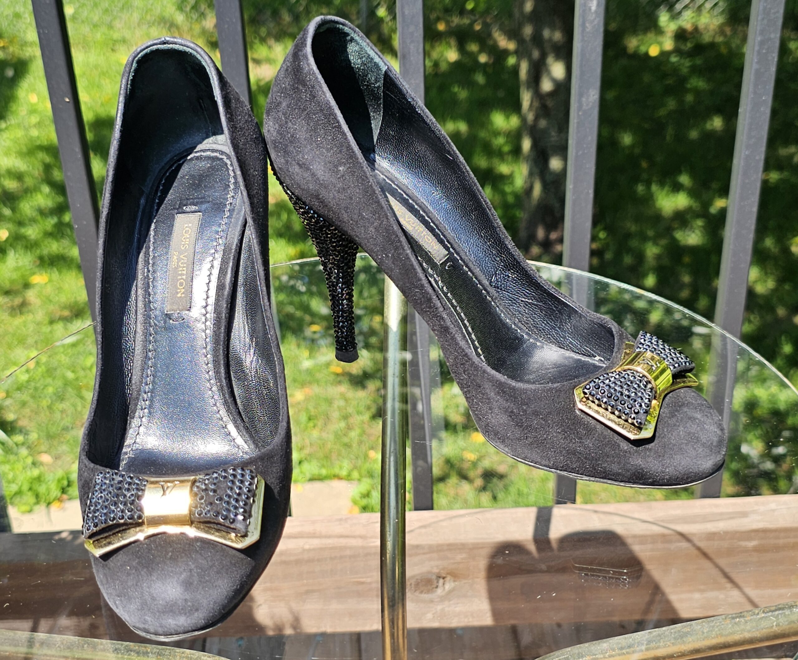 Louis Vuitton suede pumps with crystal embellished bows, gold LV plaques and crystal covered stiletto heels