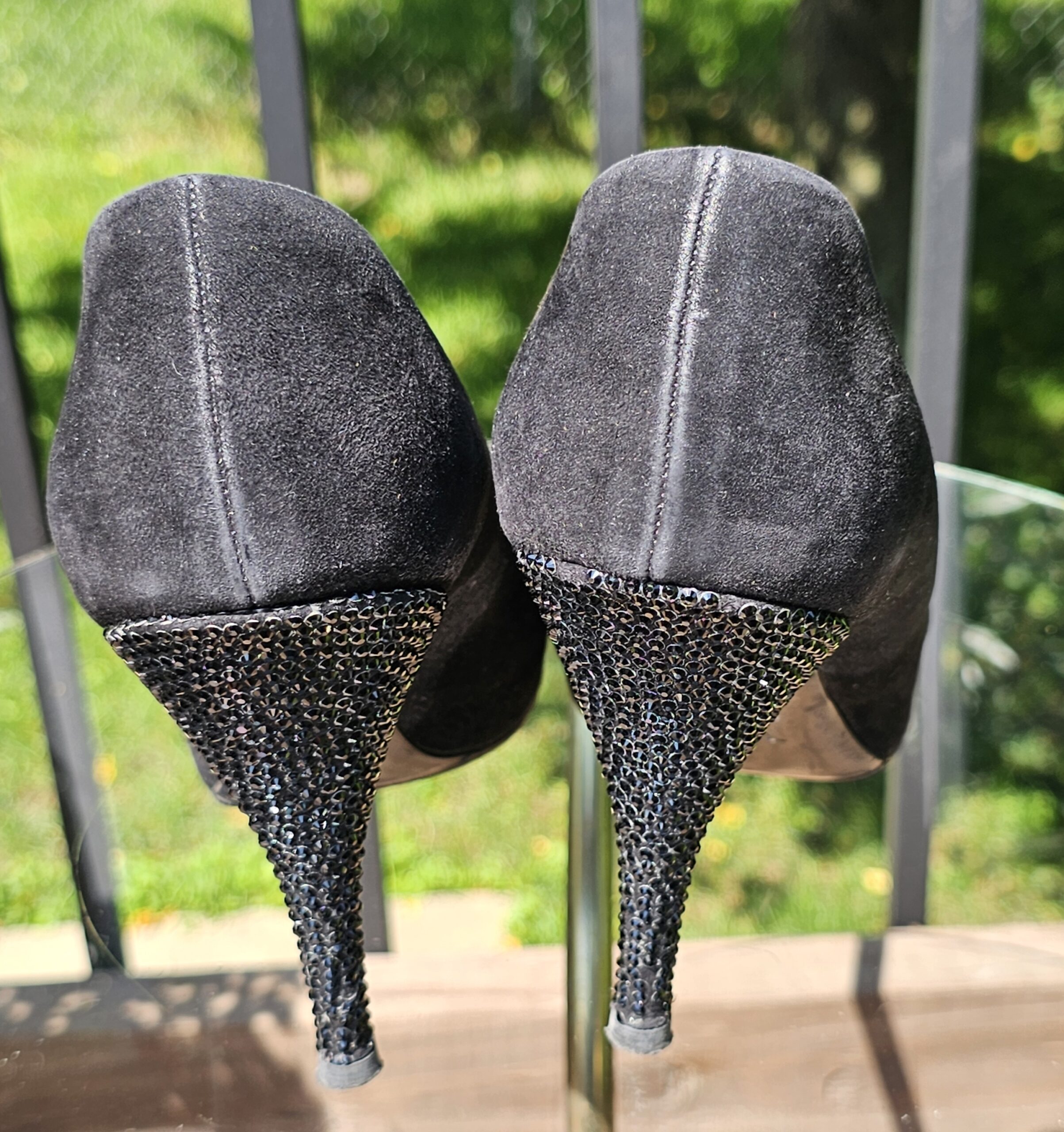 Back of the Louis Vuitton suede pumps showing the crystal covered stiletto heels
