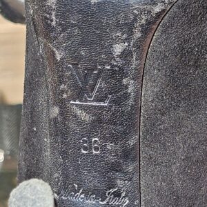 LV logo, size 36 and Made in Italy stamped on the sole of the Louis Vuitton crystal bow suede pumps