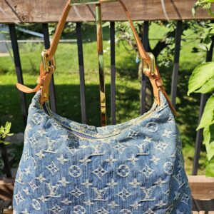 Back of the Louis Vuitton Monogram Denim Baggy PM showing the crisp blue Monogram denim pattern